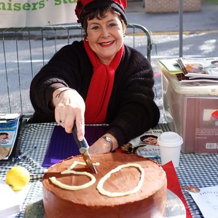 Archer Sara Coward cuts our 50th cake