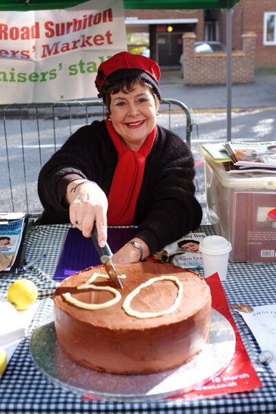 Archer Sara Coward cuts our 50th cake